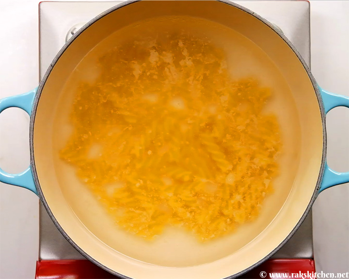 Fusilli pasta in boiling water